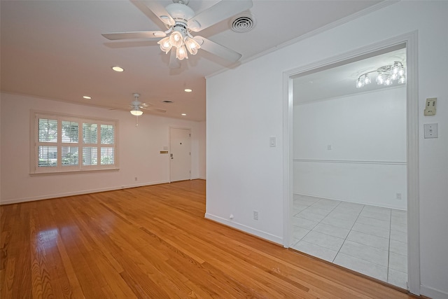 5049 De Milo Dr, Houston, TX 77092 - empty room with ceiling fan, light wood-type flooring, and recessed lighting