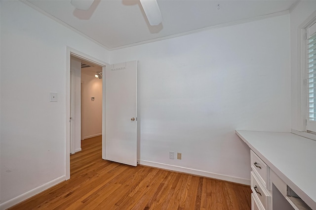 5049 De Milo Dr, Houston, TX 77092 - unfurnished room featuring light wood-style floors, a ceiling fan, and crown molding