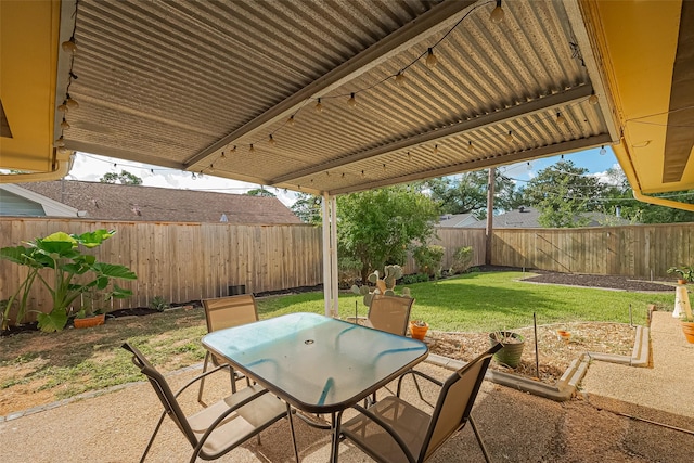 5049 De Milo Dr, Houston, TX 77092 - fenced backyard featuring outdoor dining space and a patio