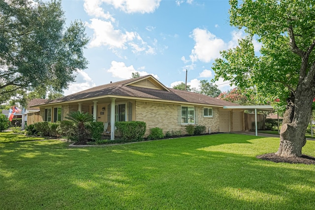 5049 De Milo Dr, Houston, TX 77092 - view of side of home with a lawn and a carport