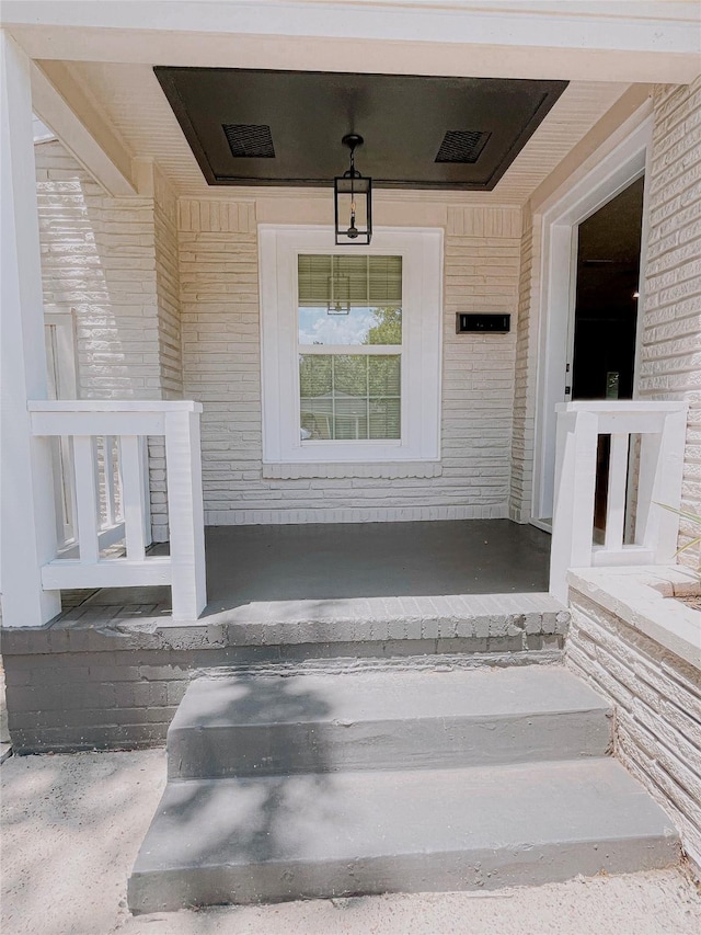 4521 Kingsbury St, Houston, TX 77021 - property entrance featuring covered porch and brick siding