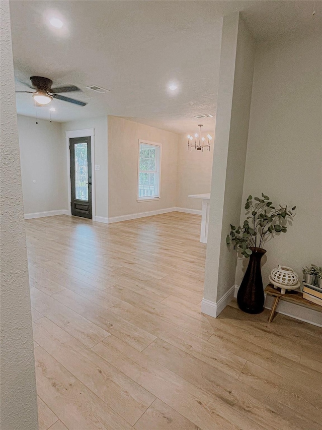 4521 Kingsbury St, Houston, TX 77021 - empty room featuring a chandelier, light wood-style floors, a ceiling fan, and recessed lighting