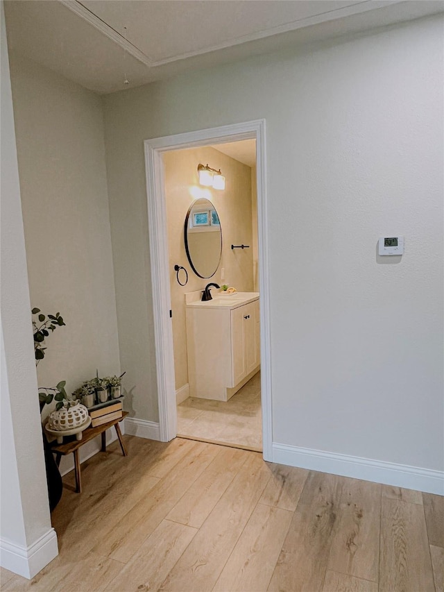 4521 Kingsbury St, Houston, TX 77021 - hallway featuring attic access and light wood-type flooring