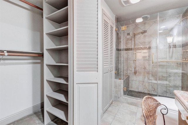 49 Briar Hollow Ln Unit 1801, Houston, TX 77027 - full bathroom featuring a closet and a shower stall