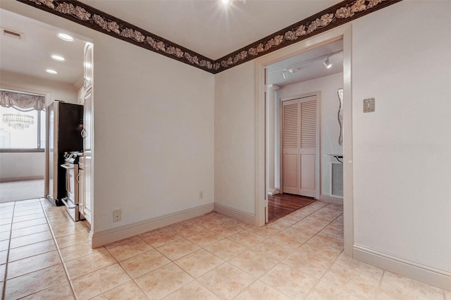 49 Briar Hollow Ln Unit 1801, Houston, TX 77027 - empty room with light tile patterned flooring and recessed lighting