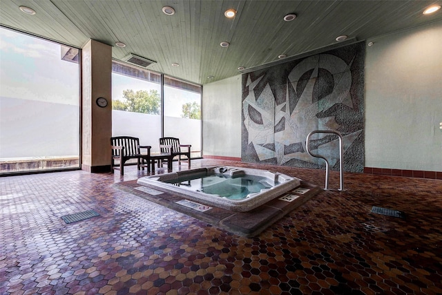 49 Briar Hollow Ln Unit 1801, Houston, TX 77027 - sunroom / solarium with a jacuzzi