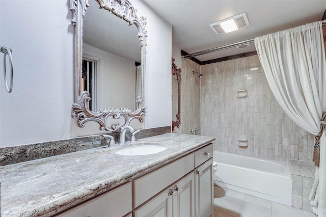 49 Briar Hollow Ln Unit 1801, Houston, TX 77027 - full bathroom featuring vanity, shower / bath combo, and tile patterned floors