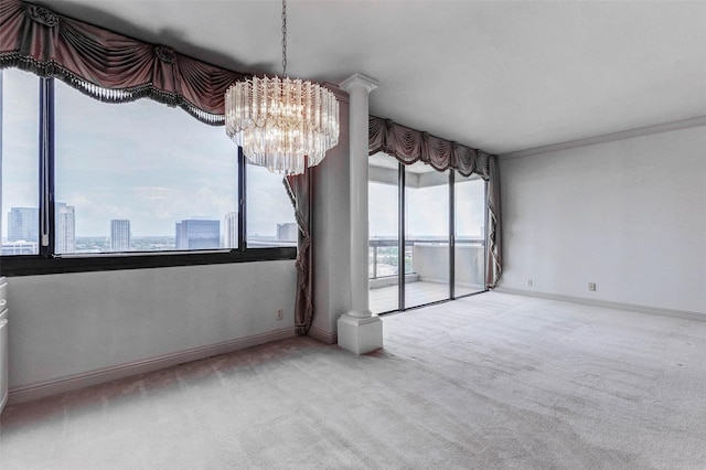 49 Briar Hollow Ln Unit 1801, Houston, TX 77027 - carpeted empty room with a chandelier and ornamental molding
