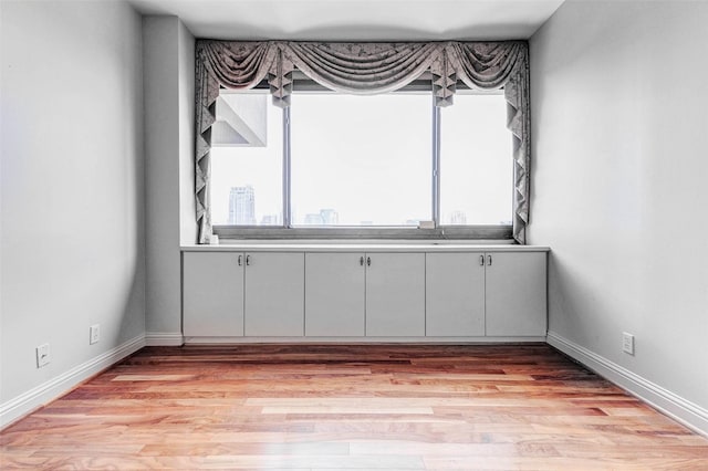 49 Briar Hollow Ln Unit 1801, Houston, TX 77027 - unfurnished room with light wood-type flooring