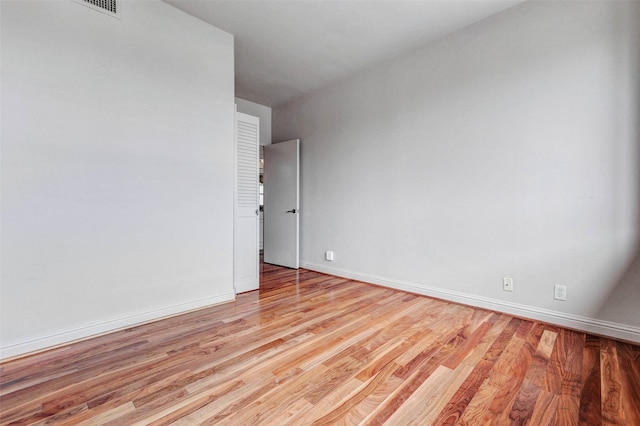 49 Briar Hollow Ln Unit 1801, Houston, TX 77027 - spare room with wood finished floors
