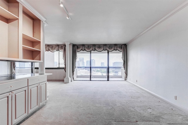 49 Briar Hollow Ln Unit 1801, Houston, TX 77027 - unfurnished living room with light colored carpet and crown molding