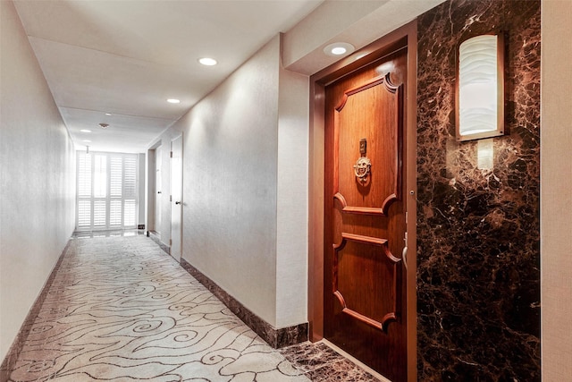 49 Briar Hollow Ln Unit 1801, Houston, TX 77027 - hallway featuring recessed lighting and baseboards