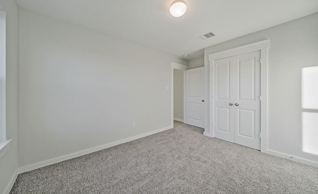 4446 Azalea Blossom Rd, Pinehurst, TX 77362 - unfurnished bedroom with carpet and a closet