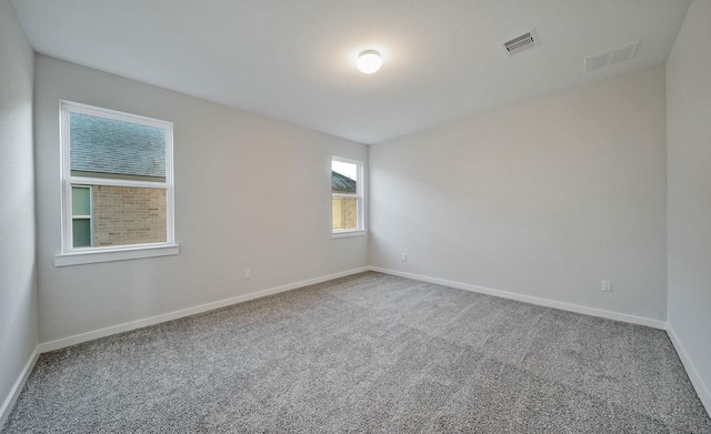 4446 Azalea Blossom Rd, Pinehurst, TX 77362 - carpeted empty room with baseboards