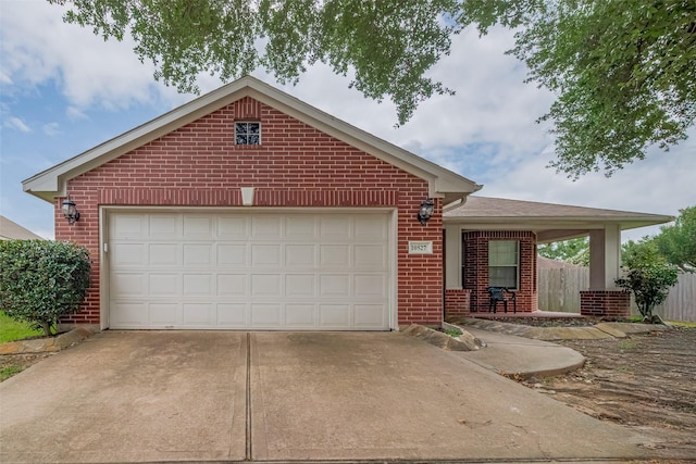 10527 Friars Hl, Houston, TX 77070 - ranch-style house with brick siding, driveway, and a garage