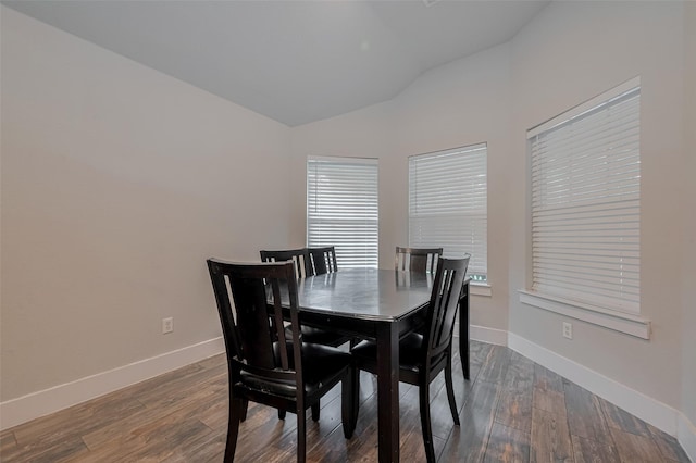 10527 Friars Hl, Houston, TX 77070 - dining room featuring vaulted ceiling and wood finished floors