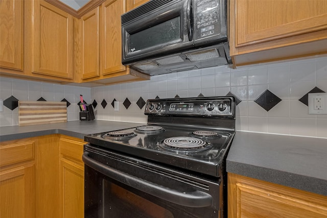10527 Friars Hl, Houston, TX 77070 - kitchen featuring black appliances, tasteful backsplash, and dark countertops
