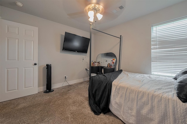 10527 Friars Hl, Houston, TX 77070 - carpeted bedroom featuring ceiling fan and baseboards