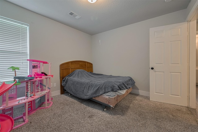 10527 Friars Hl, Houston, TX 77070 - carpeted bedroom featuring baseboards