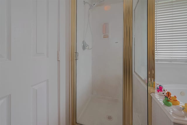10527 Friars Hl, Houston, TX 77070 - bathroom with a stall shower and a garden tub