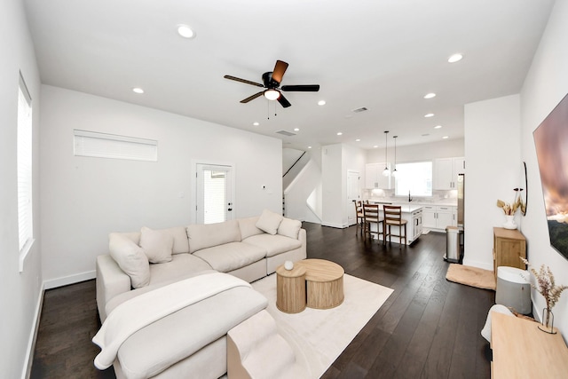 5502 Wheatley St Unit B, Houston, TX 77091 - living area with a ceiling fan, dark wood-style flooring, healthy amount of natural light, recessed lighting, and stairway