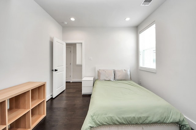 5502 Wheatley St Unit B, Houston, TX 77091 - bedroom with dark wood-type flooring and recessed lighting
