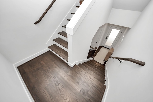 5502 Wheatley St Unit B, Houston, TX 77091 - staircase featuring wood finished floors and baseboards