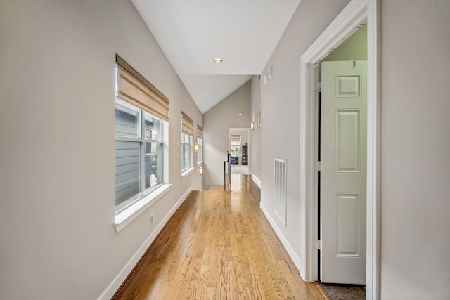 1013 Crocker St, Houston, TX 77019 - corridor with light wood finished floors and lofted ceiling