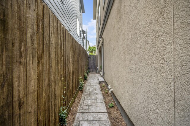 1013 Crocker St, Houston, TX 77019 - view of side of home with stucco siding