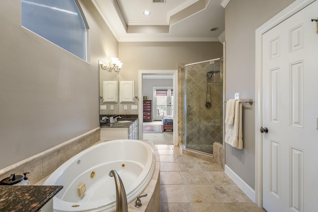 1013 Crocker St, Houston, TX 77019 - bathroom featuring vanity, crown molding, a jetted tub, a shower stall, and tile patterned floors