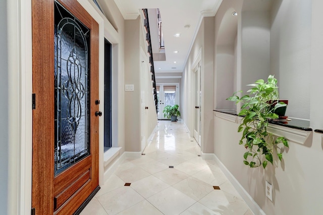1013 Crocker St, Houston, TX 77019 - entrance foyer featuring light tile patterned floors, ornamental molding, and recessed lighting