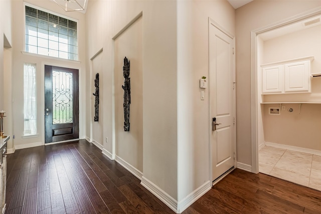 14062 Dunsmore Landing Dr, Houston, TX 77059 - entrance foyer featuring dark wood-style floors and baseboards