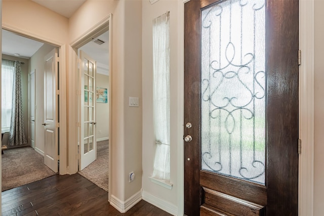 14062 Dunsmore Landing Dr, Houston, TX 77059 - entryway featuring dark wood-style floors and baseboards