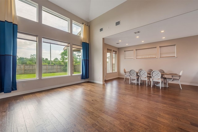 14062 Dunsmore Landing Dr, Houston, TX 77059 - living room with plenty of natural light, wood finished floors, a towering ceiling, and recessed lighting