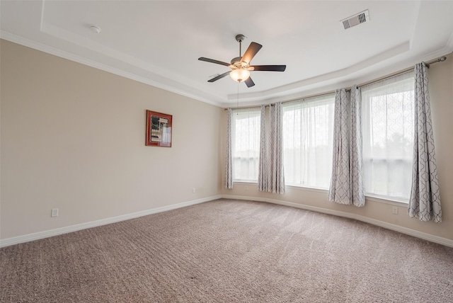 14062 Dunsmore Landing Dr, Houston, TX 77059 - carpeted spare room with a raised ceiling, ceiling fan, plenty of natural light, and ornamental molding