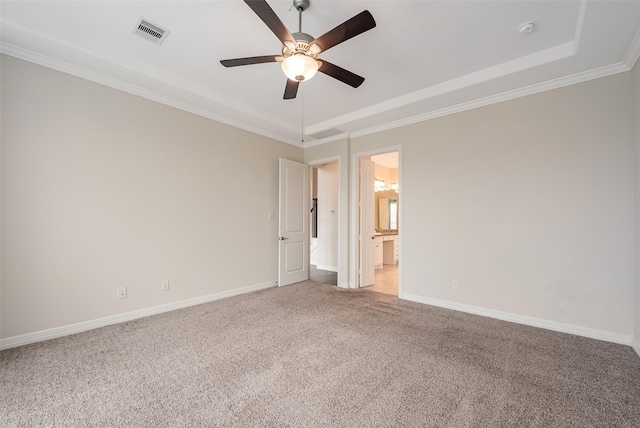 14062 Dunsmore Landing Dr, Houston, TX 77059 - spare room featuring a tray ceiling, light carpet, a ceiling fan, a smoke detector, and ornamental molding