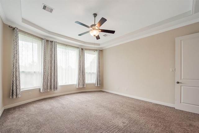 14062 Dunsmore Landing Dr, Houston, TX 77059 - carpeted spare room featuring a raised ceiling, a ceiling fan, and crown molding