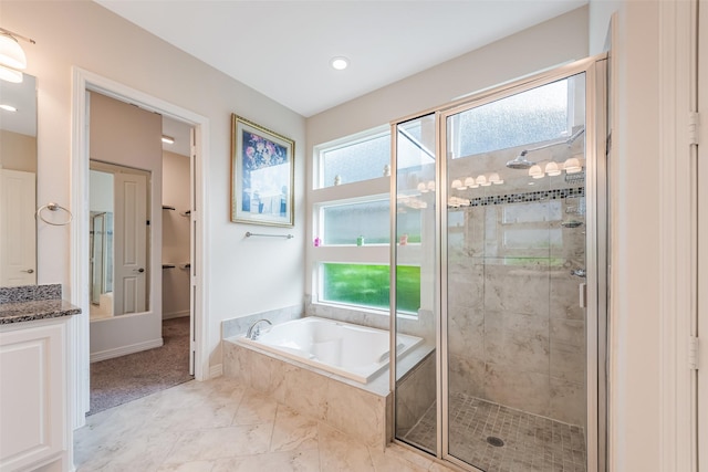 14062 Dunsmore Landing Dr, Houston, TX 77059 - bathroom featuring a stall shower, healthy amount of natural light, a garden tub, vanity, and recessed lighting
