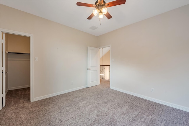 14062 Dunsmore Landing Dr, Houston, TX 77059 - unfurnished bedroom featuring carpet floors, a walk in closet, and ceiling fan