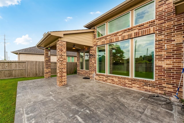 14062 Dunsmore Landing Dr, Houston, TX 77059 - view of patio featuring ceiling fan