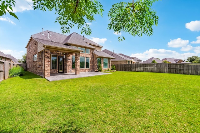 14062 Dunsmore Landing Dr, Houston, TX 77059 - rear view of property featuring a patio area, a fenced backyard, and brick siding
