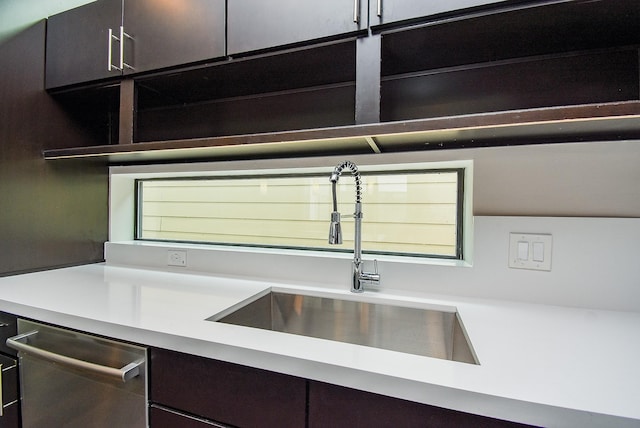 5638 Petty St Unit B, Houston, TX 77007 - kitchen with stainless steel dishwasher, light countertops, and dark brown cabinets