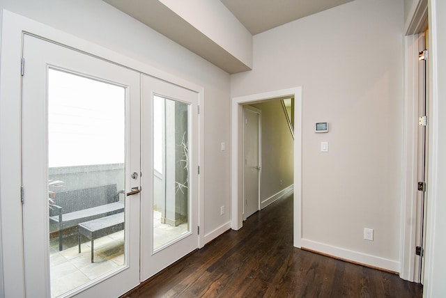 5638 Petty St Unit B, Houston, TX 77007 - doorway to outside featuring dark wood-style flooring and baseboards