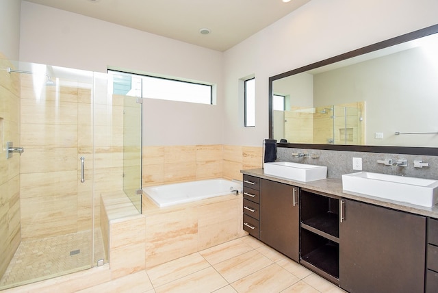 5638 Petty St Unit B, Houston, TX 77007 - bathroom with a bath, a stall shower, double vanity, and tile patterned flooring