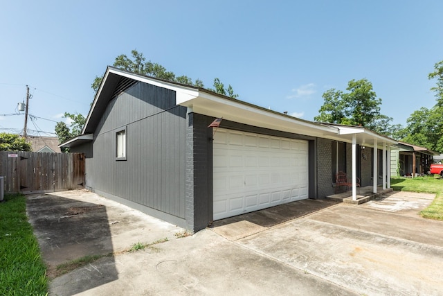 107 Sage St, Lake Jackson, TX 77566 - view of property exterior featuring driveway and an attached garage