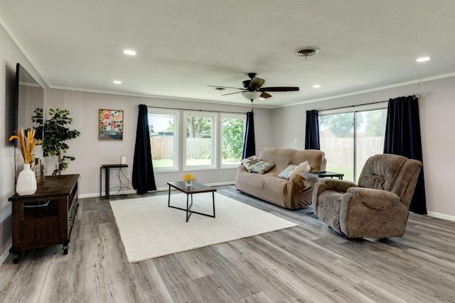 107 Sage St, Lake Jackson, TX 77566 - living area with crown molding, wood finished floors, a ceiling fan, and recessed lighting