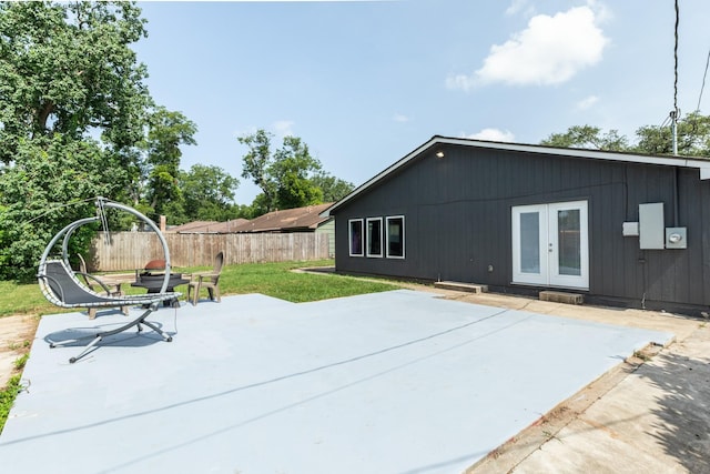 107 Sage St, Lake Jackson, TX 77566 - rear view of property with french doors and a patio area