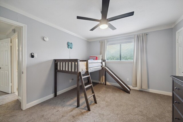 1643 Fall Valley Dr, Houston, TX 77077 - bedroom with light carpet, ornamental molding, and ceiling fan