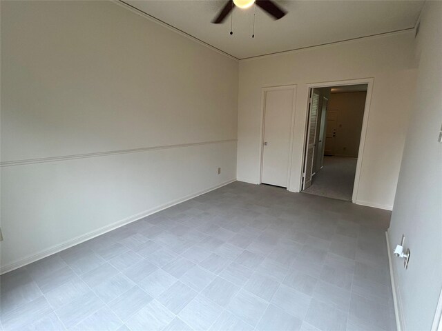 850 Threadneedle St Unit 71, Houston, TX 77079 - spare room featuring ceiling fan and tile patterned floors