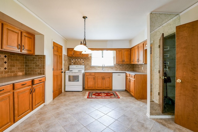 7111 Oak Village Dr, Houston, TX 77396 - kitchen featuring white appliances, brown cabinetry, and decorative backsplash